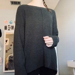 dark green sweater